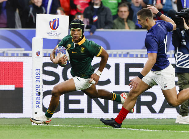 Kurt-Lee Arendse of South Africa scores a try against France during the first half of a Rugby World Cup quarterfinal match at Stade de France in...