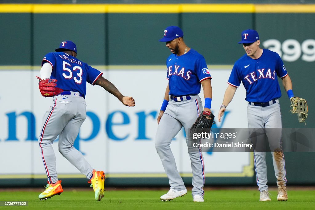 Texas Rangers Latin Adolis Garcia, Leody Taveras and Evan Carter of the Texas Rangers ...