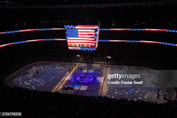 Tim Kepler sings the national anthem prior to the start of the game between the Anaheim Ducks and the Carolina Hurricanes on October 15, 2023 at...