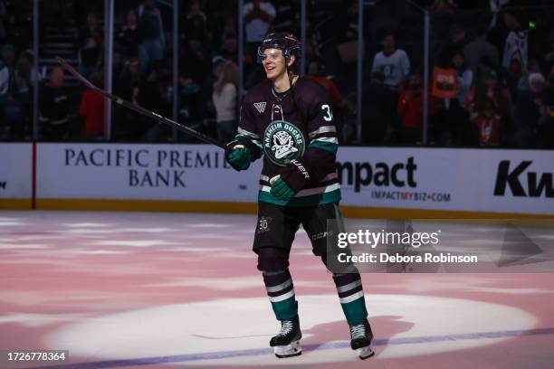 Pavel Mintyukov of the Anaheim Ducks smiles following a 6-3 win against the Carolina Hurricanes on October 15, 2023 at Honda Center in Anaheim,...