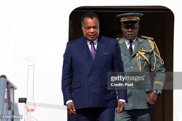 Congolese President Denis Sassou Nguesso arrives at Beijing Capital International Airport ahead of the Third Belt and Road Forum on October 16, 2023...