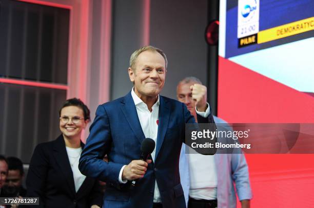 Donald Tusk, former president of the European Union and leader of the Civic Coalition, reacts to exit polls during an election night rally in Warsaw,...