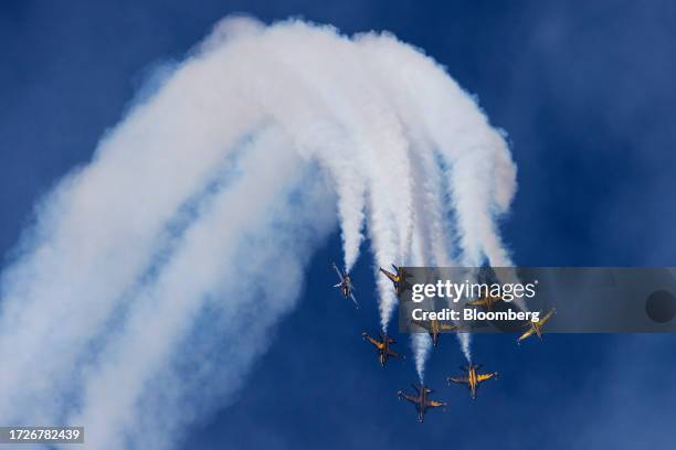 The South Korean Air Force Black Eagles aerobatics team perform maneuvers in South Korean T-50 jets, developed by Korea Aerospace Industries Ltd....