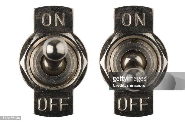 on/off switches - turning on or off stockfoto's en -beelden