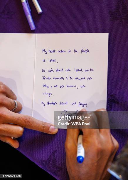 Prime Minister Rishi Sunak writes a message of goodwill to the people of Israel, whilst visiting a north London Jewish School on October 16, 2023 in...