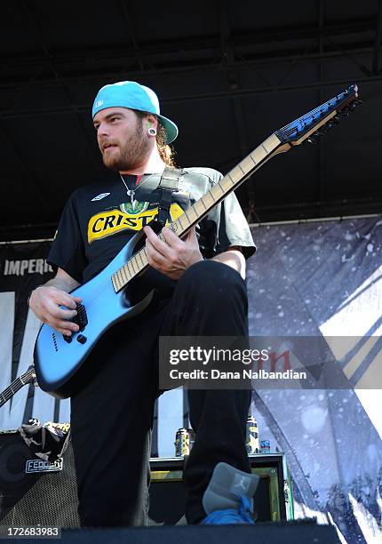 Guitar player Jesse Ketive of Emmure performs at White River Amphitheater on July 3, 2013 in Auburn, Washington.