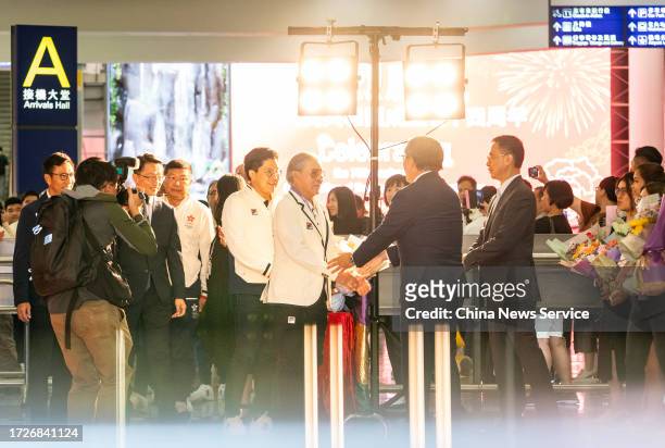 President of the Sports Federation and Olympic Committee of Hong Kong Timothy Fok Tsun-ting and head of the Hong Kong delegation Kenneth Fok Kai-kong...