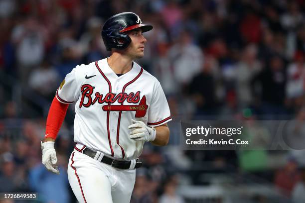 Matt Olson of the Atlanta Braves runs to first base after hitting a single in the seventh inning against the Philadelphia Phillies during Game Two of...