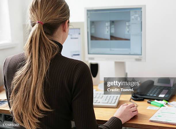 young architect in front of a screen - person in front of computer stock pictures, royalty-free photos & images