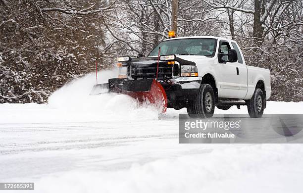 plowing the road - snow stock pictures, royalty-free photos & images