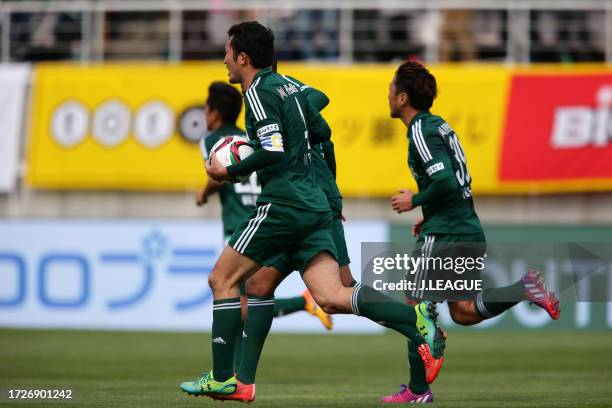 Yoshiro Abe of Matsumoto Yamaga reacts after scoring the team's first goal during the J.League J1 first stage match between Matsumoto Yamaga and...