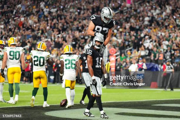 Jakobi Meyers of the Las Vegas Raiders celebrates his touchdown catch with Michael Mayer during the second quarter against the Green Bay Packers at...