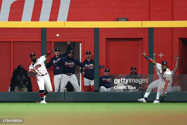 Michael Harris II of the Atlanta Braves makes a throw in the ninth inning against the Philadelphia Phillies during Game Two of the Division Series at...