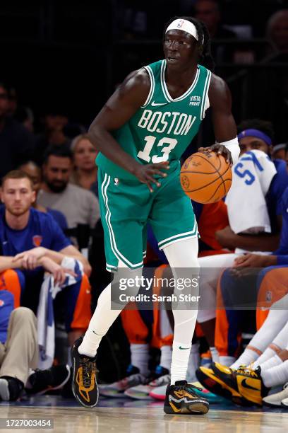 Wenyen Gabriel of the Boston Celtics dribbles during the second half of a preseason game against the New York Knicks at Madison Square Garden on...