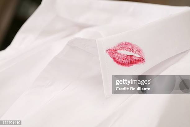 valentine's day kiss on a white shirt - lippenstift afdruk stockfoto's en -beelden