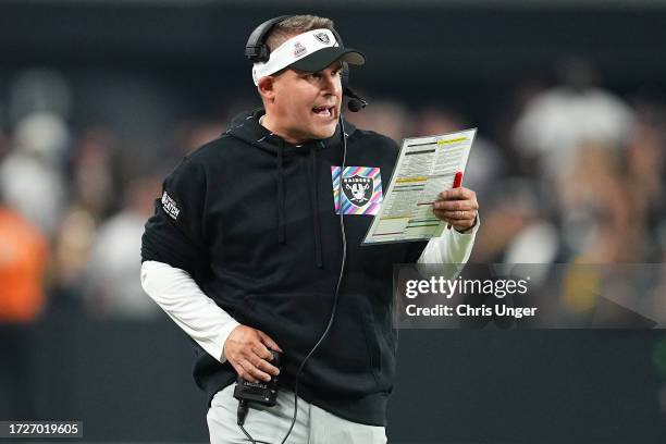 Head coach Josh McDaniels of the Las Vegas Raiders calls a play during the fourth quarter against the Green Bay Packers at Allegiant Stadium on...