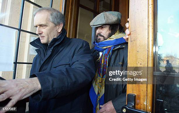 Italian opera singer Luciano Pavarotti and Gianni Mantovani, the father of Pavarotti's partner Nicoletta Mantovani, leave Saint Orsola hospital...