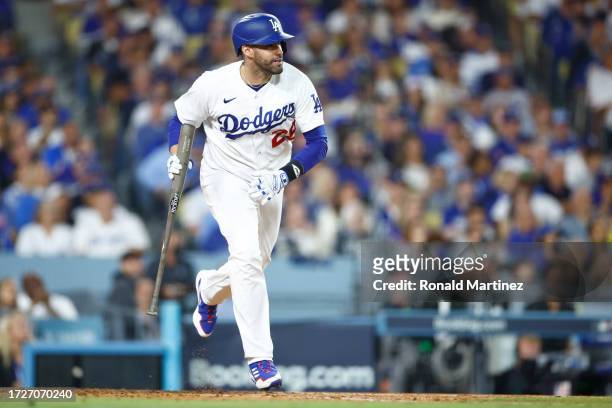 Martinez of the Los Angeles Dodgers hits a single against the Arizona Diamondbacks during the sixth inning in Game Two of the Division Series at...