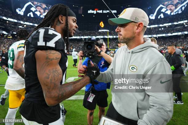 Davante Adams of the Las Vegas Raiders shakes hands with Head coach Matt LaFleur of the Green Bay Packers following the game at Allegiant Stadium on...