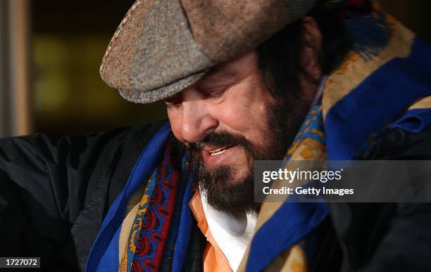 Italian opera singer Luciano Pavarotti leaves Saint Orsola hospital after visiting his partner Nicoletta Mantovani January 15, 2003 in Bologna,...