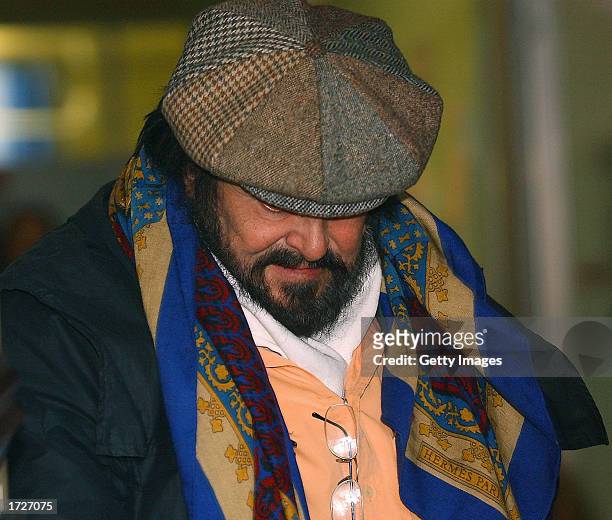 Italian opera singer Luciano Pavarotti leaves Saint Orsola hospital after visiting his partner Nicoletta Mantovani January 15, 2003 in Bologna,...