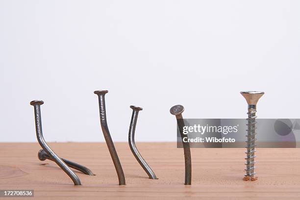 screw it! - hammer nails stock pictures, royalty-free photos & images