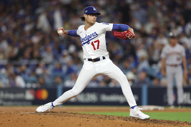 Joe Kelly of the Los Angeles Dodgers pitches against the Arizona Diamondbacks during the seventh inning in Game Two of the Division Series at Dodger...
