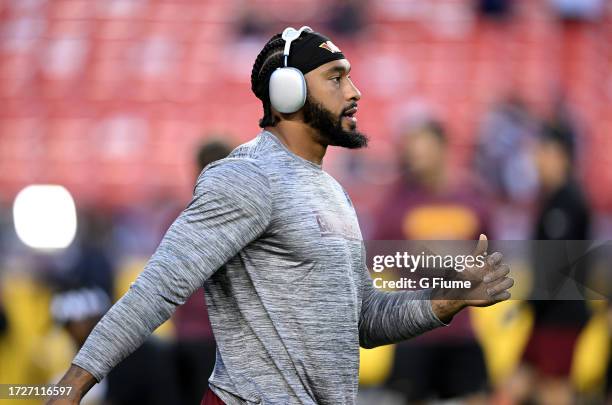 Montez Sweat of the Washington Commanders warms up before the game against the Chicago Bears at FedExField on October 05, 2023 in Landover, Maryland.