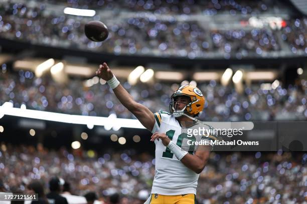 Jordan Love of the Green Bay Packers passes as he warms up prior to an NFL football game between the Las Vegas Raiders and the Green Bay Packers at...