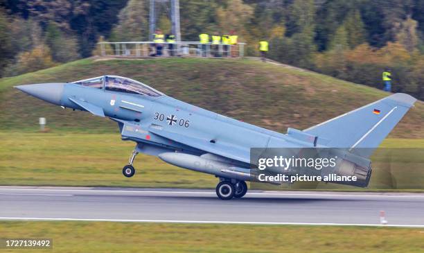 October 2023, Mecklenburg-Western Pomerania, Laage: A Eurofighter fighter aircraft lands at the airfield of Tactical Air Wing 73 "Steinhoff" during...