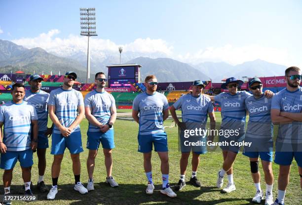 Jonny Bairstow of England looks on from the huddle prior to being presented with their 100th cap ahead of the ICC Men's Cricket World Cup India 2023...