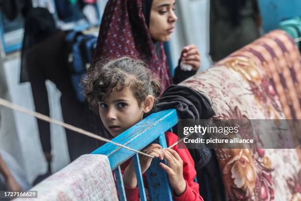 October 2023, Palestinian Territories, Khan Yunis: Displaced Palestinians take shelter in a UN school in Khan Yunis, as fighting continues between...
