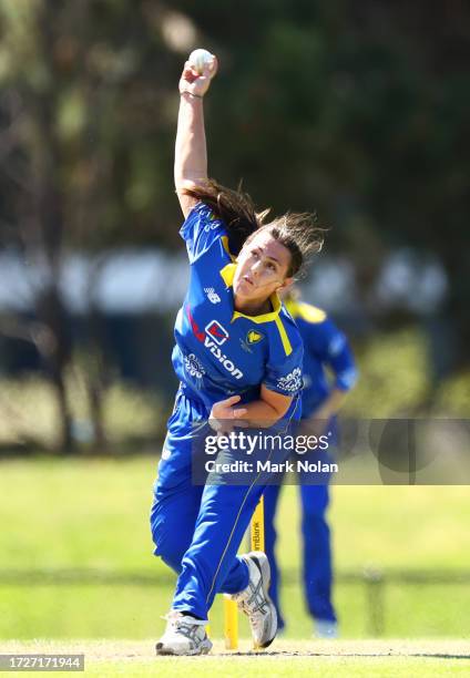 Amy Hunter of the ACT bowls during the WNCL match between ACT and Tasmania at EPC Solar Park, on October 10 in Canberra, Australia.