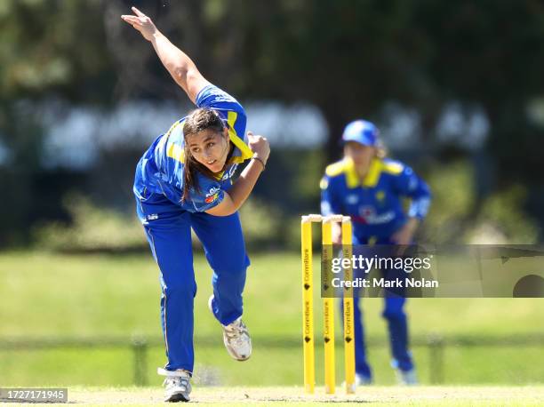 Amy Hunter of the ACT bowls during the WNCL match between ACT and Tasmania at EPC Solar Park, on October 10 in Canberra, Australia.