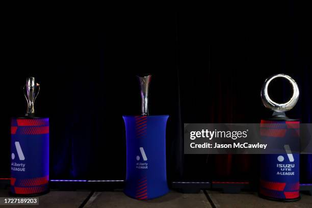 The Liberty A-League championship trophy, The A-League club champions trophy and The A-League Men championship trophy are displayed during the...