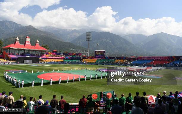 Players of England and Bangladesh line up for the National Anthems ahead of the ICC Men's Cricket World Cup India 2023 between England and Bangladesh...