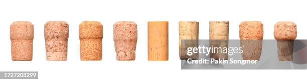 group of natural wine corks, recycled corks isolated on a white background. clipping path - bouchon en liège photos et images de collection
