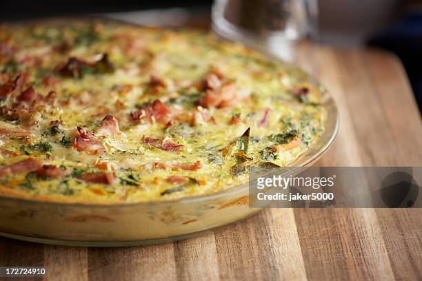an egg and bacon frittata in a glass bowl - frittata stock pictures, royalty-free photos & images