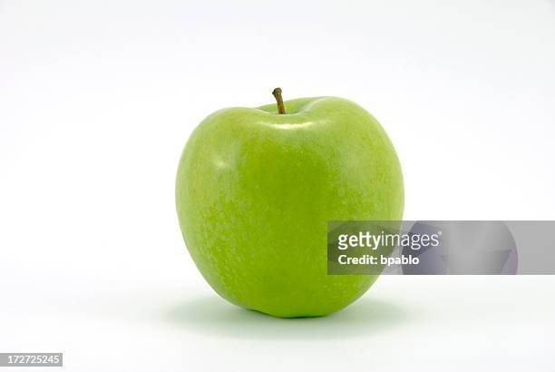 close-up of fresh granny smith apple - apple isolated stock pictures, royalty-free photos & images