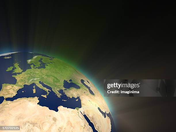 earth with light rays i (europe) - map europe globe stock pictures, royalty-free photos & images