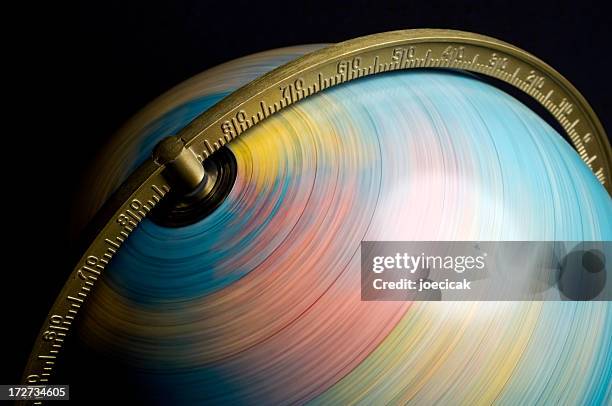 spinning globe - global business concept stock pictures, royalty-free photos & images