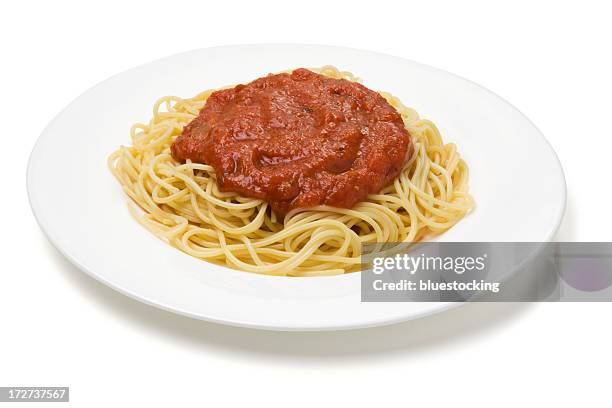 plate of spaghetti with red sauce on a white plate - tomato sauce stock pictures, royalty-free photos & images