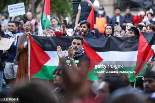 Protestors attend a Pro-Palestine rally on October 10, 2023 in Melbourne, Australia. The Palestinian militant group Hamas launched a surprise attack...