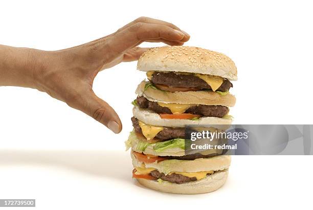 burger snatcher - giant cheeseburger stock pictures, royalty-free photos & images