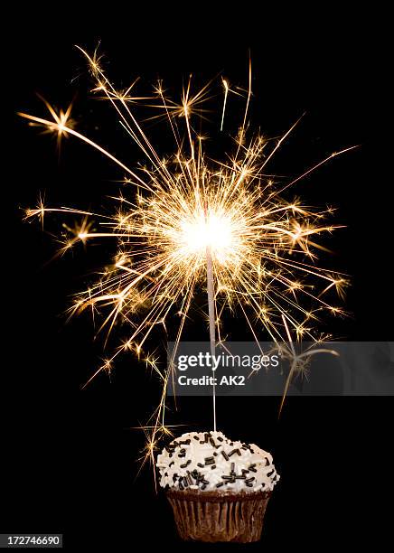 cupcake with sparkler on black - cake isolated stock pictures, royalty-free photos & images