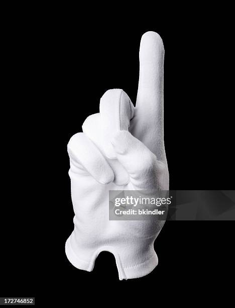 gloved hand holding up one index finger - white glove stock pictures, royalty-free photos & images