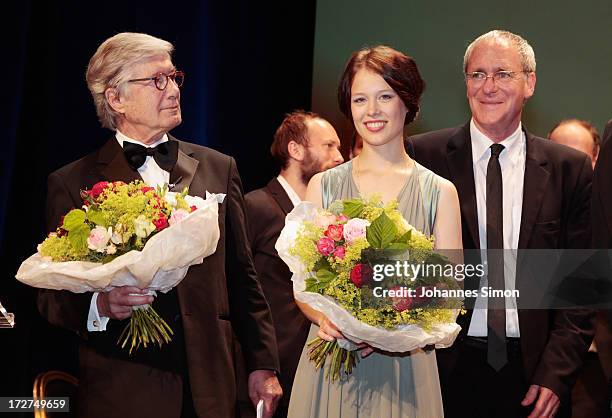 Christian Wolff, Paula Beer and August Zirner pose with the award trophy after the Bernhard Wicki Award ceremony at Munich Film Fesitval on July 4,...