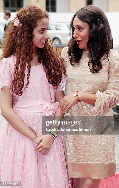 Saudi Arabian actress and award winner Waad Mohammed and Saudi Arabian director Haifaa Al Mansour arrive for the Bernhard Wicki Award ceremony at...