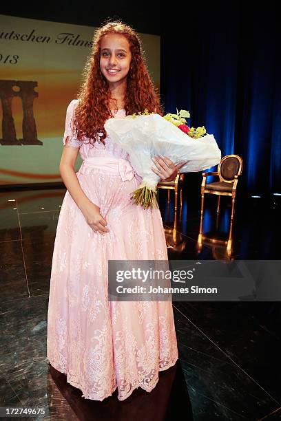 Saudi Arabian actress and award winner Waad Mohammed poses after the Bernhard Wicki Award ceremony at Munich Film Fesitval on July 4, 2013 in Munich,...