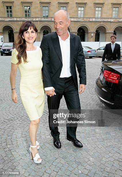 German actor Heiner Lauterbach and his wife Viktoria Lauterbach arrive for the Bernhard Wicki Award ceremony at Munich Film Fesitval on July 4, 2013...